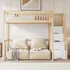 A loft bed with a sofa underneath, set against a white paneled wall. Produktbild-Vorschau