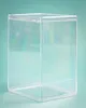 A clear plastic protective display case for Funko POP! figures is shown against a teal background. Anteprima dell’immagine prodotto
