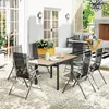 An outdoor patio scene with a dining set and seating area. Produktbild-Vorschau