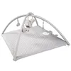 A baby play mat with a play arch and hanging toys. Produktbild-Vorschau