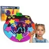 A young girl is shown next to a colorful dance mat with cartoon figures and stars. Náhled obrázku produktu