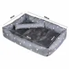 A dog bed with dimensions indicated by measurement lines and text. Anteprima dell’immagine prodotto