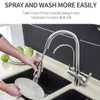 A person is washing a plate under a kitchen faucet. Náhľad obrázku produktu
