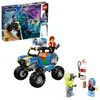 A LEGO Hidden Side playset featuring a buggy, figures, and a gas pump, with the product box in the background. Náhled obrázku produktu