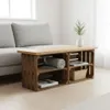 A coffee table made of wooden crates with a wooden top, placed in a living room next to a sofa. It holds a rolled blanket, books, and a basket. A small plant is on top of the table. Náhled obrázku produktu