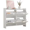 A white shoe cabinet with multiple flip-out compartments, displaying various shoes inside. Produktbild-Vorschau