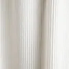 A close-up view of a textured, ribbed fabric, likely a curtain or upholstery. Produktbild-Vorschau