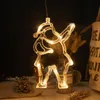 A close-up of a hanging LED Christmas decoration shaped like a reindeer, illuminated against a dark background. Produktbild-Vorschau