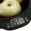 A close-up of a digital kitchen scale with apples on it, showing the display. Produktbild-Vorschau