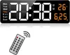A digital clock and a remote control. Produktbild-Vorschau
