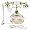 A vintage-style telephone with floral decorations. Náhľad obrázku produktu
