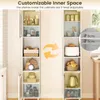 Two tall white cabinets are shown side-by-side, filled with various kitchen items. An orange arrow graphic indicates adjustability. Produktbild-Vorschau