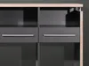A close-up view of a desk with two drawers and shelves. Produktbild-Vorschau
