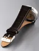 A close-up shot of a watch strap and buckle. Produktbild-Vorschau