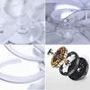 A collage of four close-up images showing different parts of a modern white ceiling fan with lights. Produktbild-Vorschau