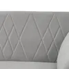 Close-up of a gray sofa with diamond tufting. Voir les images du produit