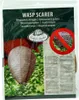 The image shows the packaging of a wasp deterrent product, with a simulated wasp nest hanging in the foreground and a 'no wasps' symbol in the background. Produktbild-Vorschau