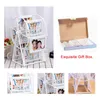 A collage of images showing a white Ferris wheel photo frame, its packaging, and close-ups of the frame. Voir les images du produit