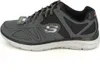 A side view of a single gray and black Skechers athletic shoe. Produktbild-Vorschau