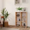 A wooden bookshelf with decorative items and plants in a room. Produktbild-Vorschau