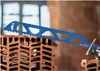 A blue saw blade is positioned over a hollow brick. Voir les images du produit