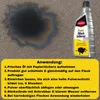 An oil stain on a textured surface next to a bottle of Caramba Power Oil Stain Remover, with application instructions. Produktbild-Vorschau