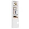 A tall, narrow white bookshelf with a door at the bottom and open shelves above, displaying decorative items and books. Produktbild-Vorschau