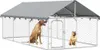 Two dogs are inside a large outdoor dog kennel with a gray roof. Podgląd zdjęcia produktu