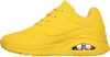 A side view of a yellow sneaker. Podgląd zdjęcia produktu