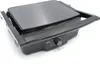 A close-up, angled view of a black electric grill on a white background. Voir les images du produit