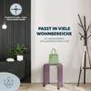 A modern entryway or living area with a dark dresser, a plant, a coat rack, and a small stool with a handbag. Anteprima dell’immagine prodotto