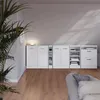 A white modular storage unit with doors and shelves is shown in a room with wooden flooring and a plant in the foreground. Anteprima dell’immagine prodotto