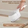 A hand holds a white garment steamer over a rug. Text overlays provide product specifications. Produktbild-Vorschau