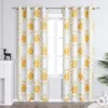 Two curtains with a sun pattern hanging in front of a window. Produktbild-Vorschau