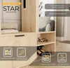 A close-up view of a wooden wardrobe with various features highlighted by text overlays. Voir les images du produit