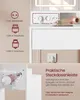 Close-up of a vanity table's integrated power strip and charging ports, with a hairdryer and phone on the surface. Produktbild-Vorschau