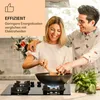 A couple is happily cooking together on a gas stove in a modern kitchen. The image has an overlay with text highlighting efficiency. Podgląd zdjęcia produktu