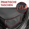 Close-up of a car seat cover with pockets holding tools, with text overlay. Produktbild-Vorschau