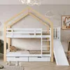 A children's bunk bed with a house-shaped frame, slide, and drawers, set in a bedroom with decorative wallpaper. Náhled obrázku produktu