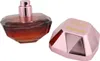 A perfume bottle and its cap are displayed against a white background. Podgląd zdjęcia produktu