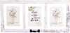 A white, distressed-finish multi-photo frame with three openings. The center opening contains a motivational quote, and the two side openings contain floral images. A black handle is attached to the bottom center. Produktbild-Vorschau