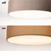 A split image showing a ceiling light fixture in two states: off and on. Produktbild-Vorschau
