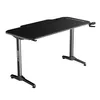 A black gaming desk shown from a diagonal angle against a white background. Produktbild-Vorschau