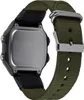 The back of a digital watch with a green fabric strap. Produktbild-Vorschau