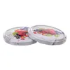 Two metal jar lids with a printed design of berries and leaves. Voir les images du produit