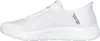 Side view of a white Skechers slip-on sneaker. Voir les images du produit