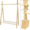A wooden clothes rack with a shelf. Produktbild-Vorschau