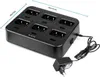 A black 6-way charger for walkie-talkies, with a power adapter and cable. Produktbild-Vorschau