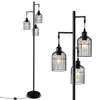 A black floor lamp with three cage-style lampshades is shown against a white background. Podgląd zdjęcia produktu