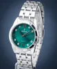 A close-up studio shot of a silver Festina watch with a green dial. Podgląd zdjęcia produktu